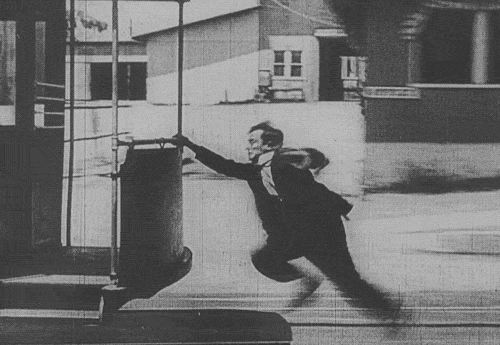 Buster Keaton running a train scene